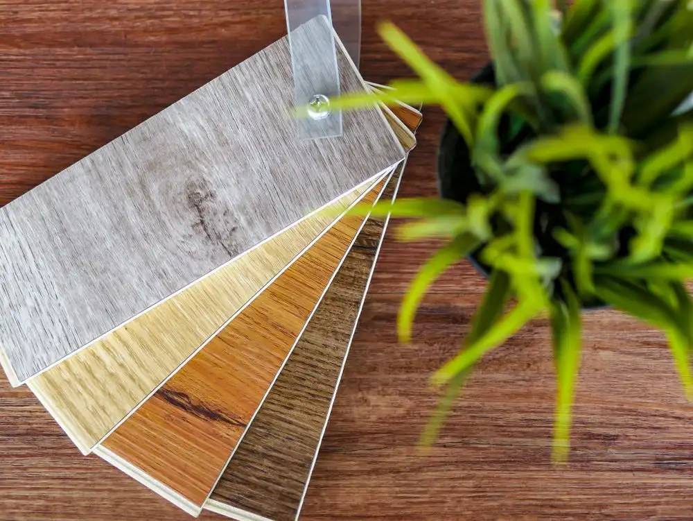 samples display different wood-like finishes and are fanned out to showcase the variety of options available